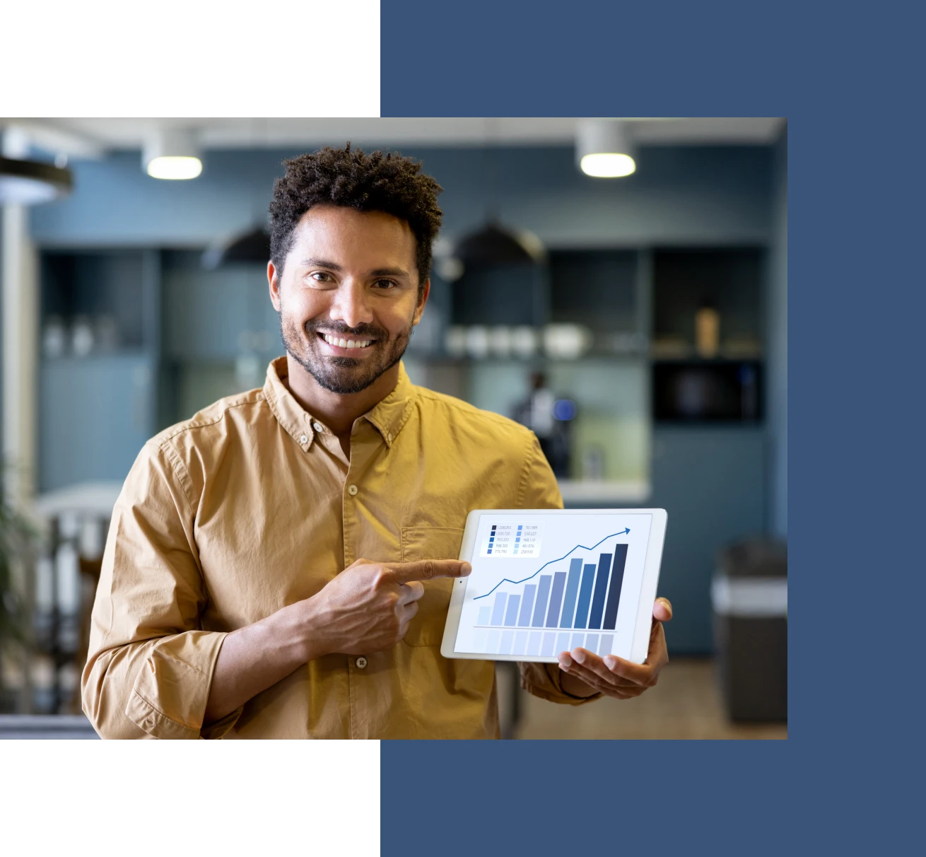 Man pointing at tablet with growth chart.