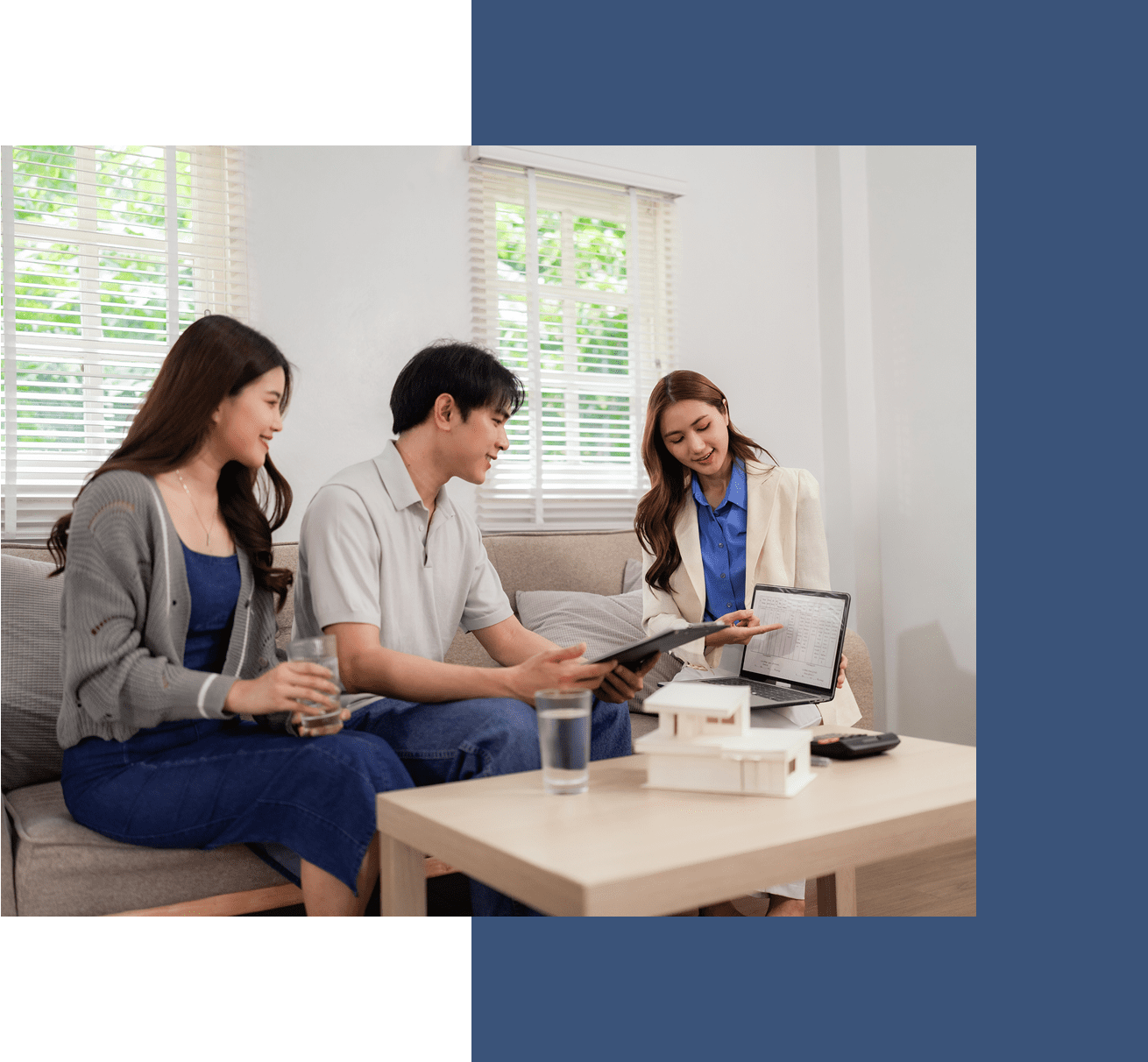 Three people discussing with a tablet.